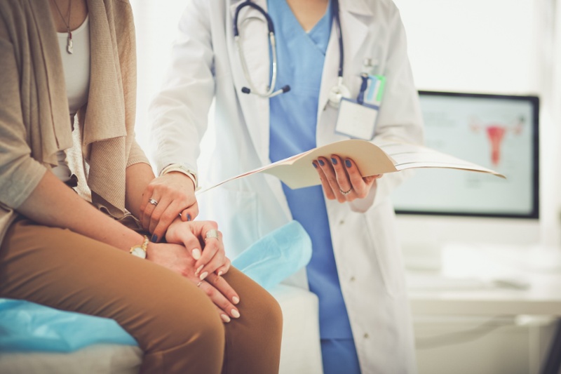 physician comforting a patient