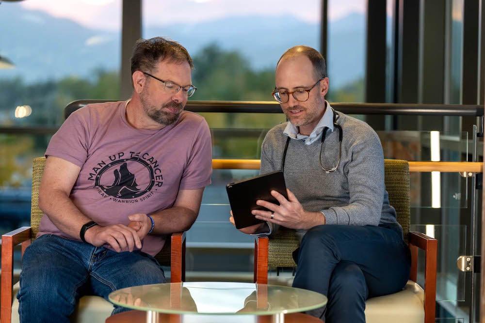 Doctor and patient looking at ipad