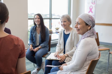 women gathering in breast cancer support group 