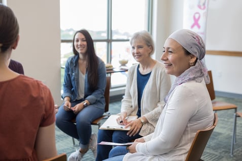 women gathering in breast cancer support group 