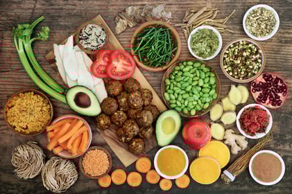A variety of colorful fruits and vegetables placed on a table