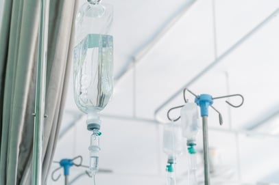 Close up saline solution drip for patient and chemotherapy infusion in hospital