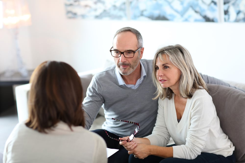 Senior couple meeting financial adviser for investment-1