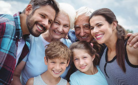 family hugging and smiling