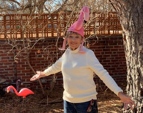 Nancy Chapin, breast cancer survivor, wears flamingo hat