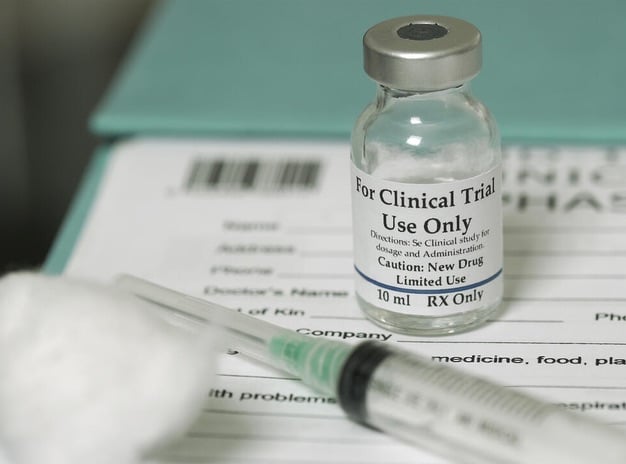 bottle of medicine and syringe