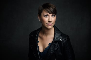 headshot of young breast cancer survivor choosing breast reconstruction after a mastectomy 