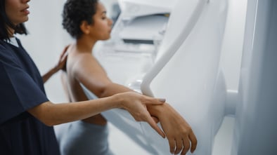 woman receiving a breast mammogram